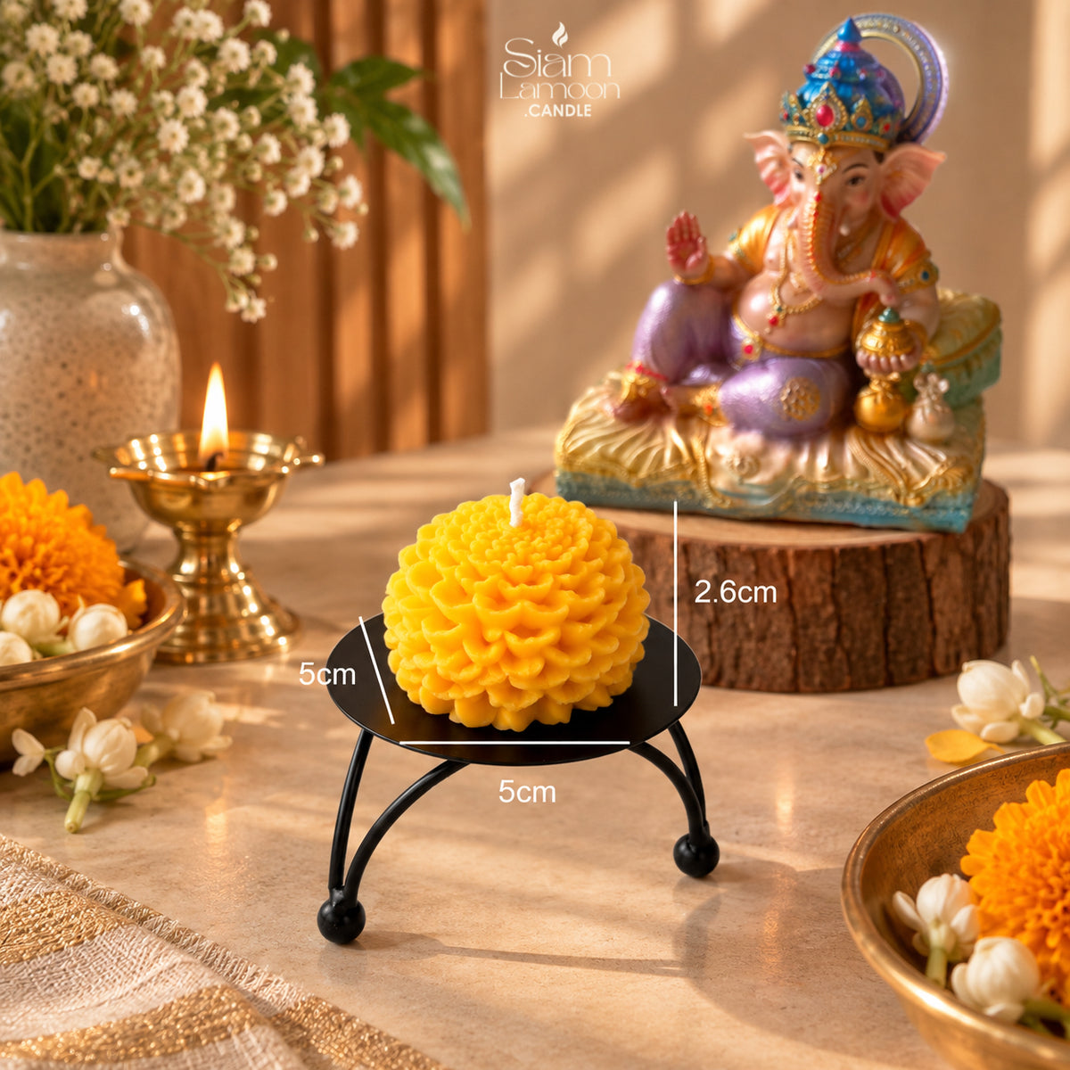 Close-up of the sculpted petals of the marigold candle